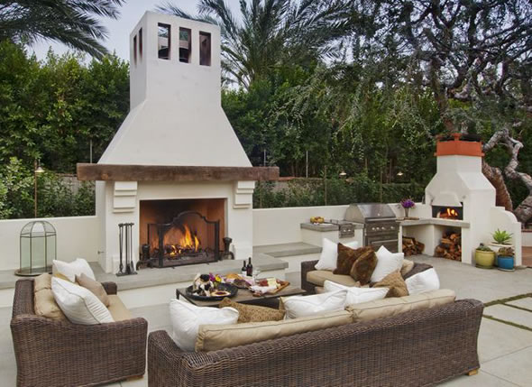 Burntech Outdoor Fireplace including couches and over area. 