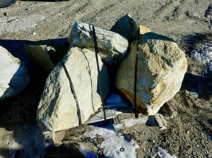 A couple of larger boulders with gold and grey tones
