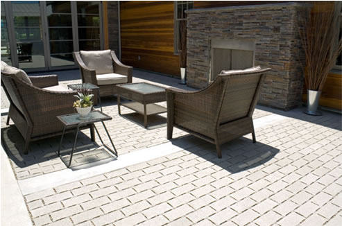 Outdoor Permeable pavers deck and chairs and table